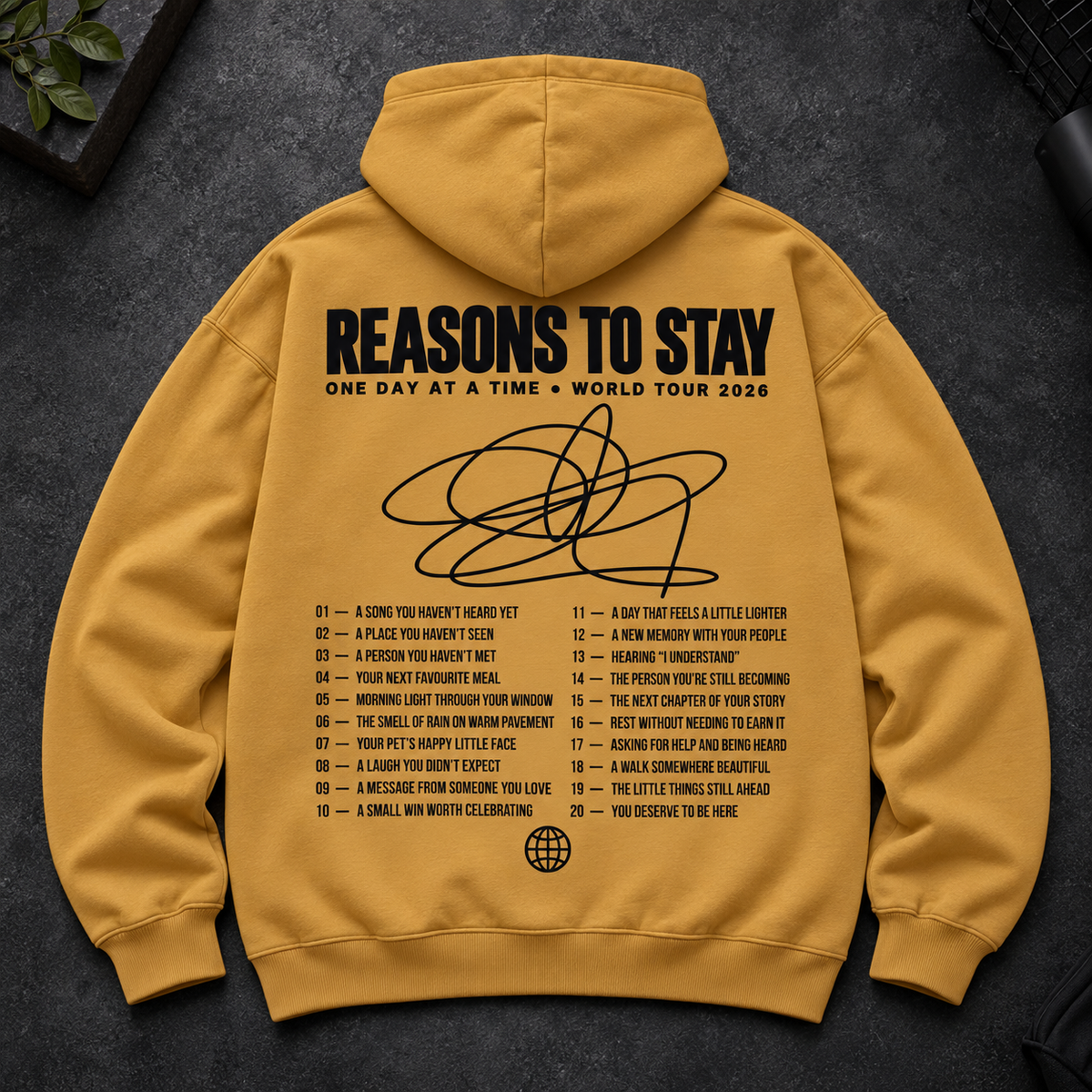 Mustard hoodie with black back print