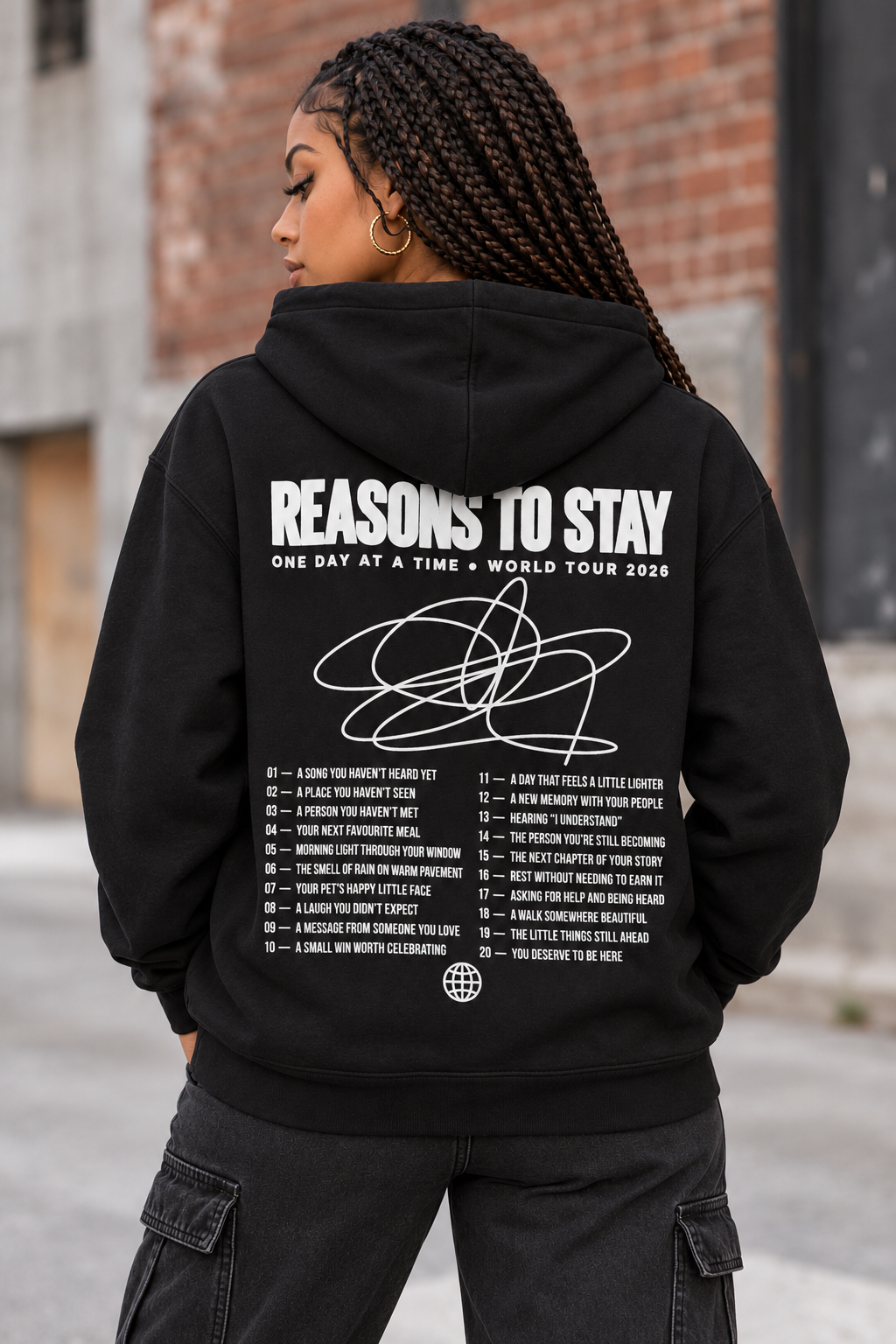 Lightweight black hoodie with drawstrings, back view with white Reasons to Stay World Tour 2026 print and 20 reasons list