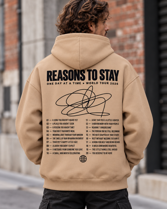 Back view of the sand Deluxe Ultra-Heavy hoodie with black Reasons to Stay print