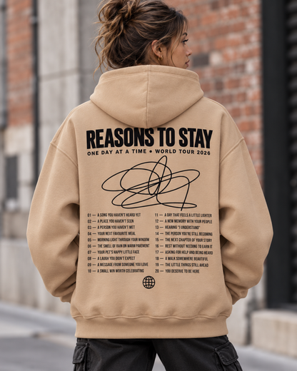 Back view of the sand Ultra-Heavy hoodie with black Reasons to Stay print