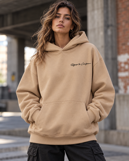 Front view of the sand Ultra-Heavy hoodie with black chest logo